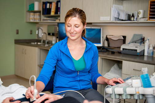 picture of our Ultrasound Technician performing an ultrasound